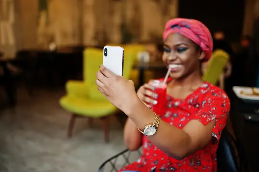 Family members staying connected through an international mobile phone top-up