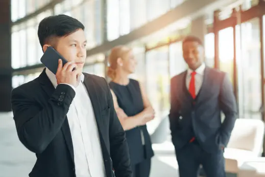 Small-business owner using a dedicated business phone number to manage customer calls professionally